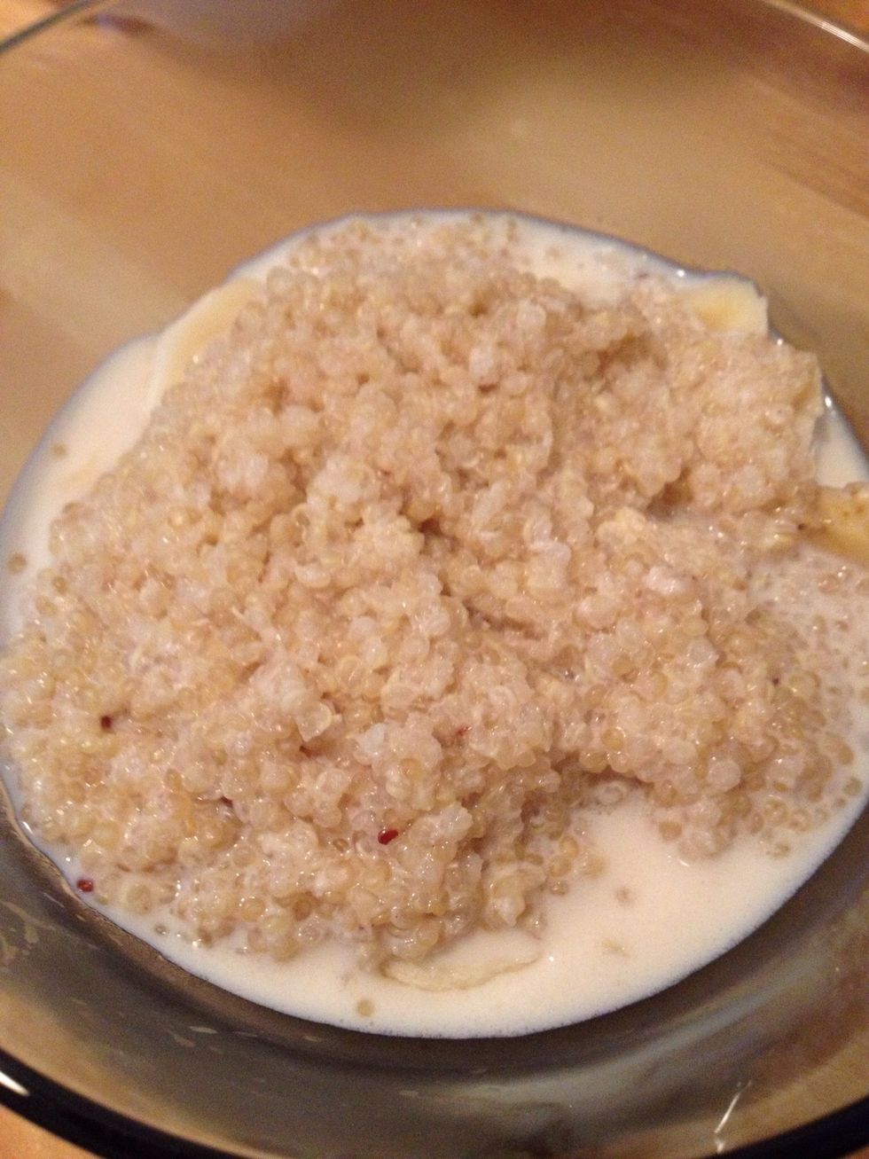 Once quinoa is cooked, mix with a fork and add another half cup of milk so that quinoa is a little bit more like more like the consistency of morning cereal.