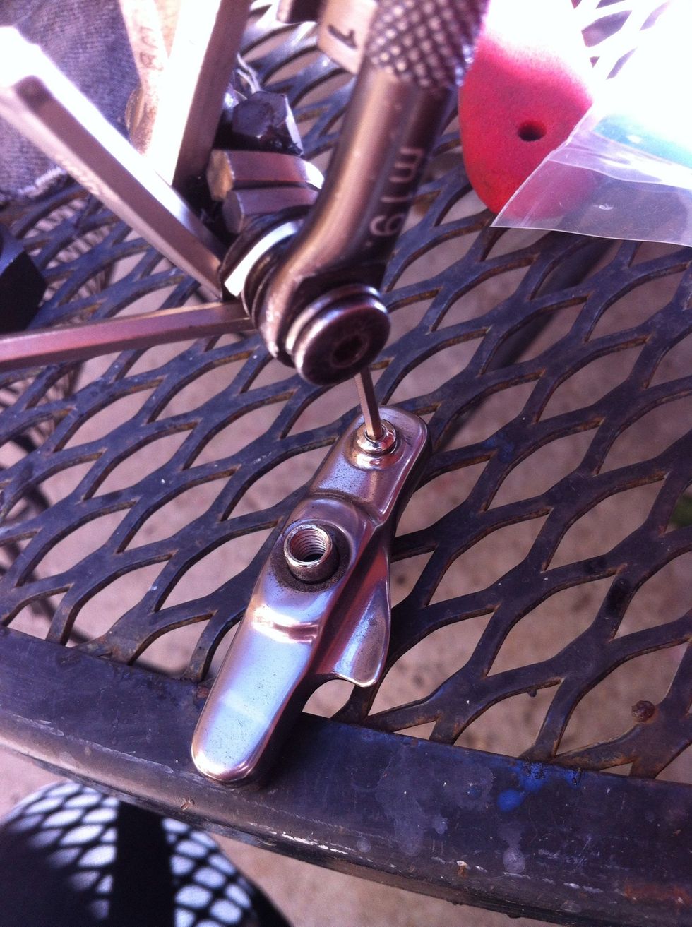 once removed, loosen the little screw that holds your break pad in.