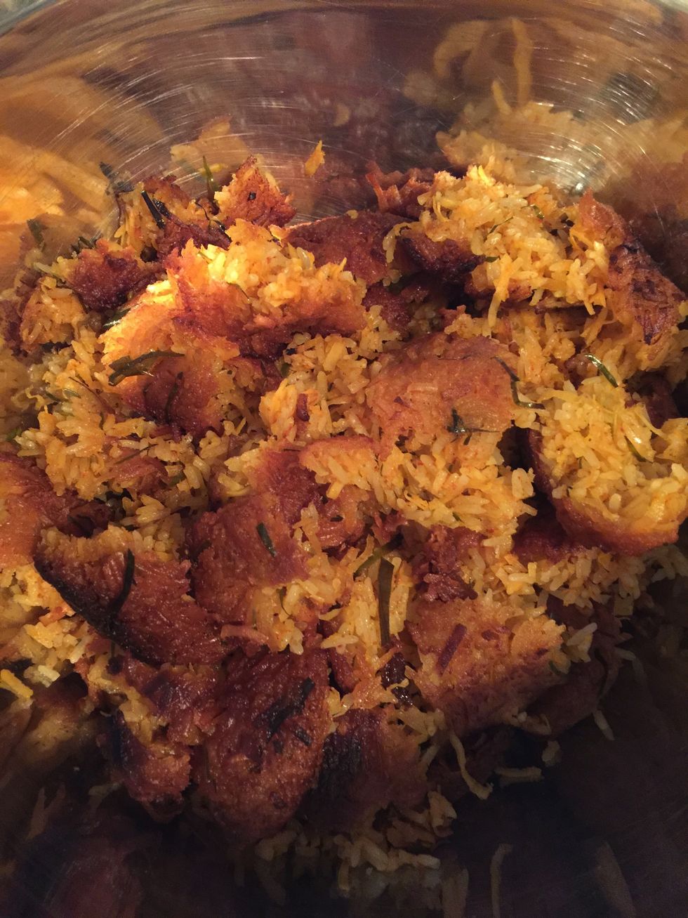 Once rice is done frying, drain them on paper towels and break them up into a large bowl.