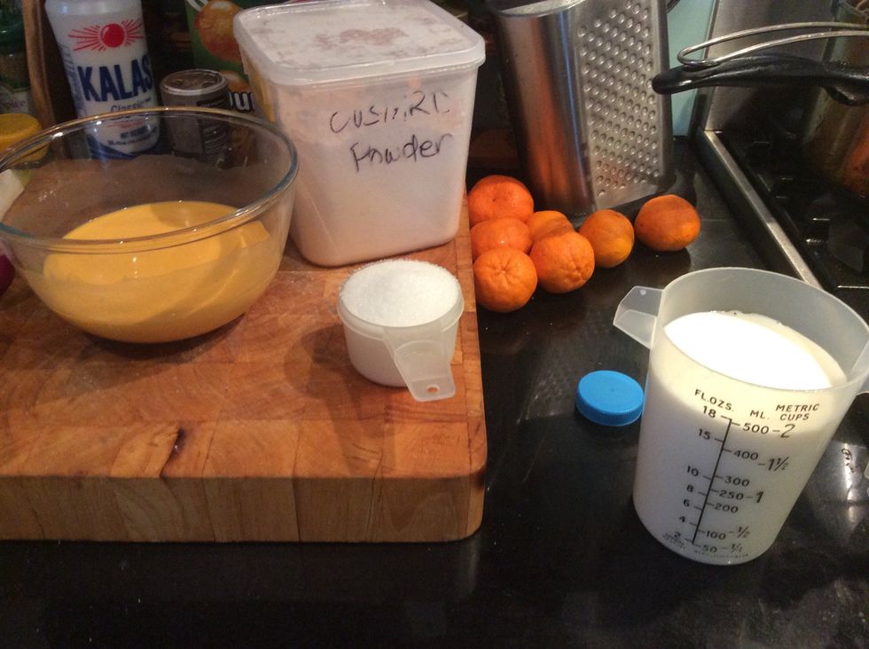 Once rice is ready add 4 cups of milk 1/2 a cup of sugar and the custard mix in the saucepan