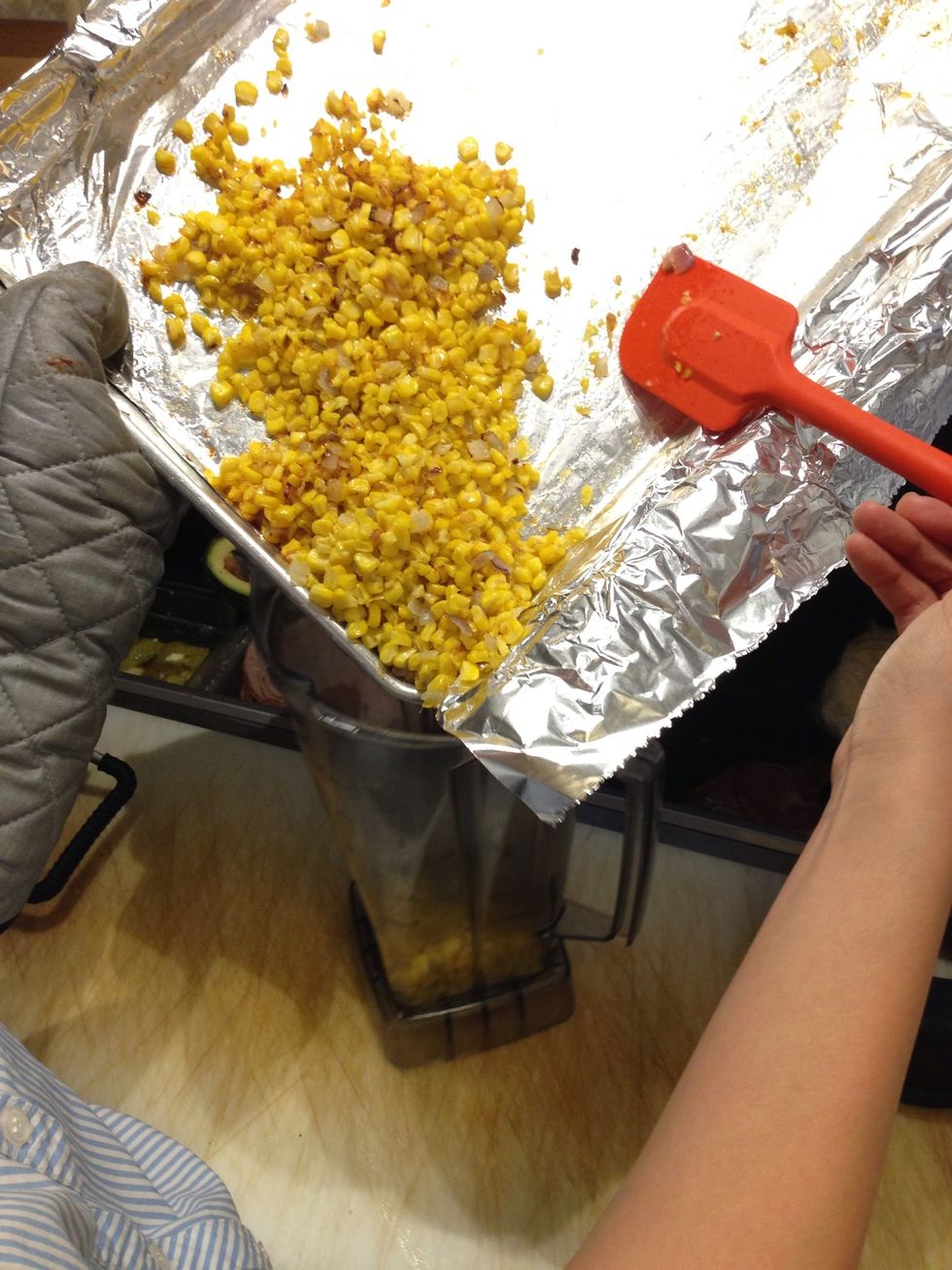 Once roasted transfer the corn and onions into the food blender.