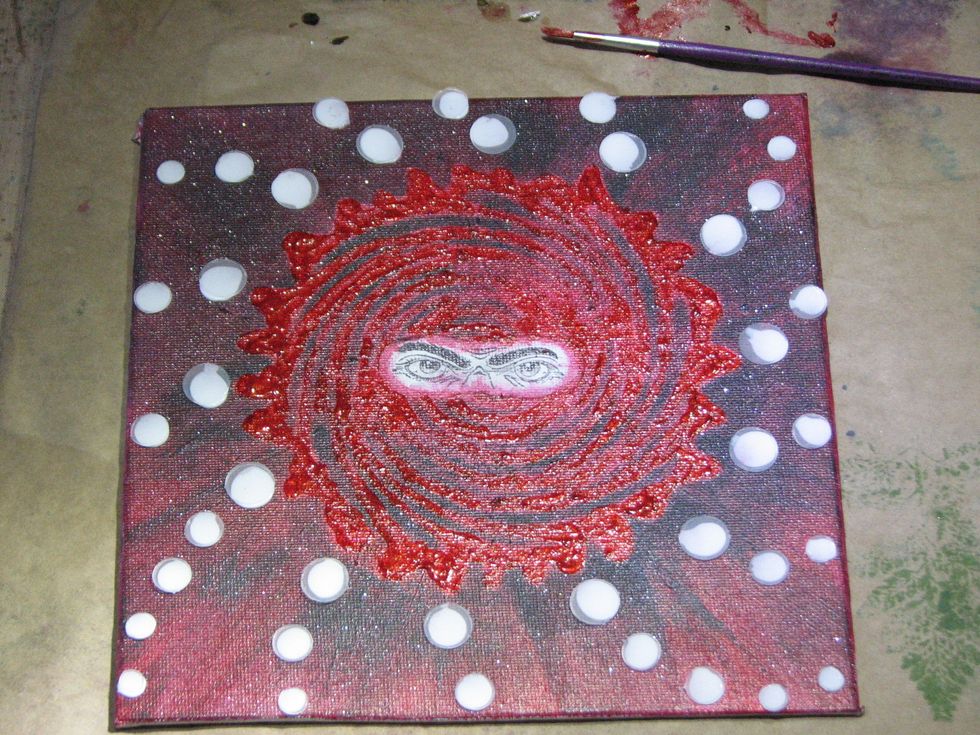 Once satisfied with the lay-out I glued each dot down to the canvas using Aleene's Tacky Glue.