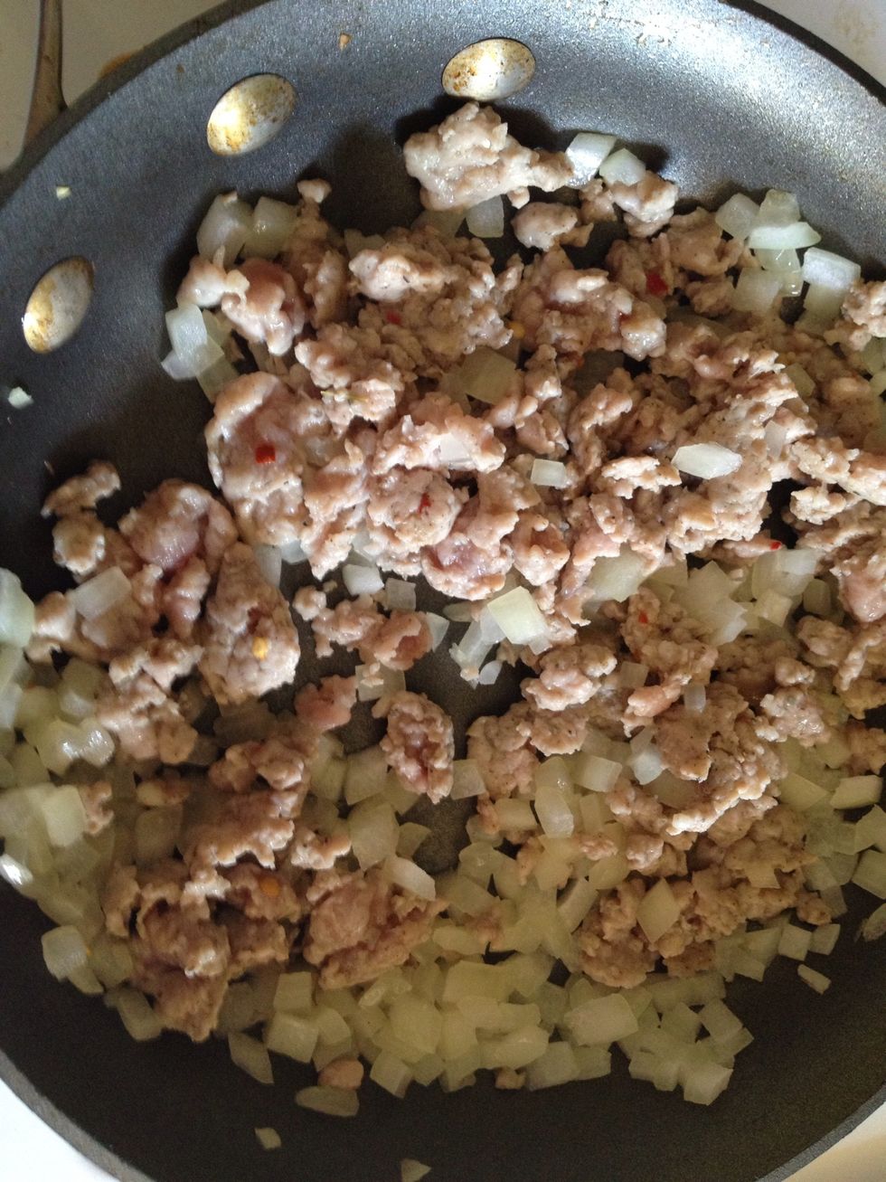 Once sausage is cooked through and onions are translucent, remove from heat and allow to cool.