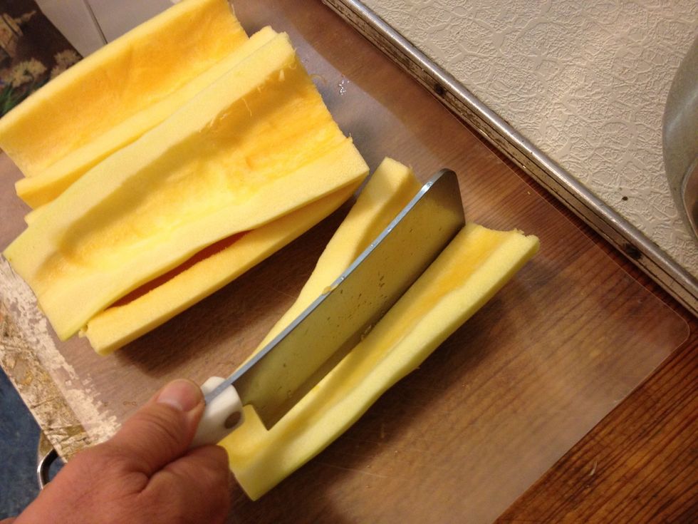 Once scooped, slice each piece in half lengthwise.