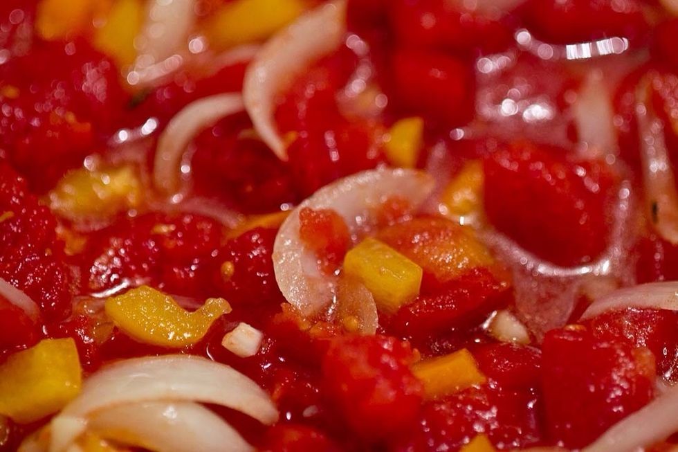 Once softened but not colored add the tomatoes and bring to boil