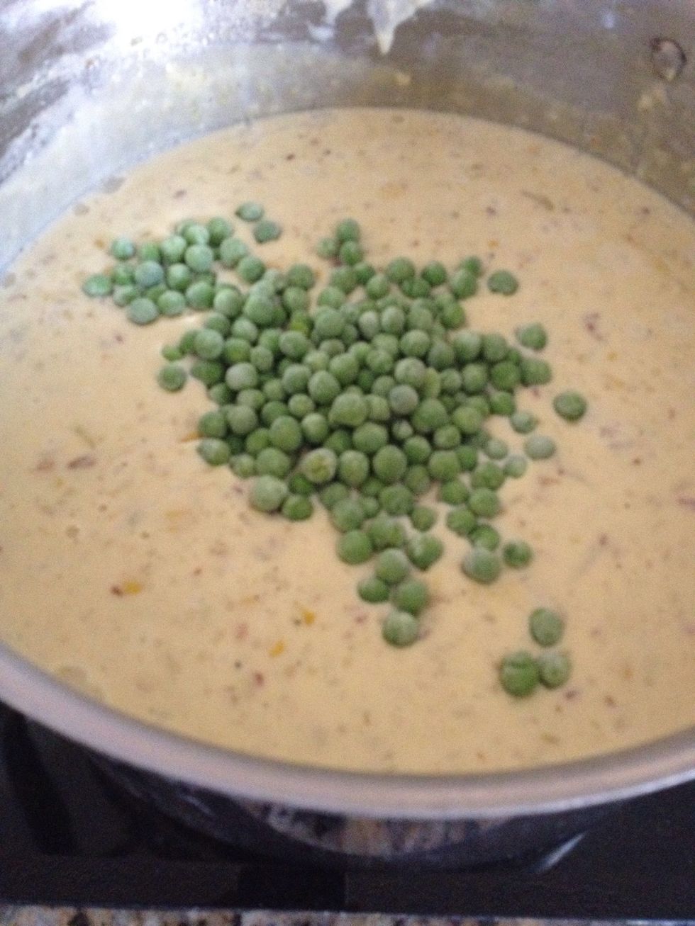 Once soup is done, i add a handful of frozen peas. Peas are pretty controversial at my house, but i like the color and flavor in the soup. If you have frozen corn, add at this point too.