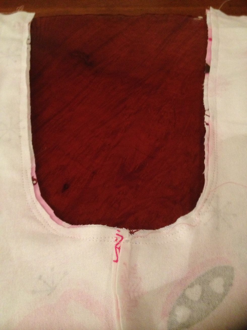 Once that seam is completed, it's time to sew the outer leg seams. But first, we need to turn the pants a bit so they're back in an inside-out pants shape.