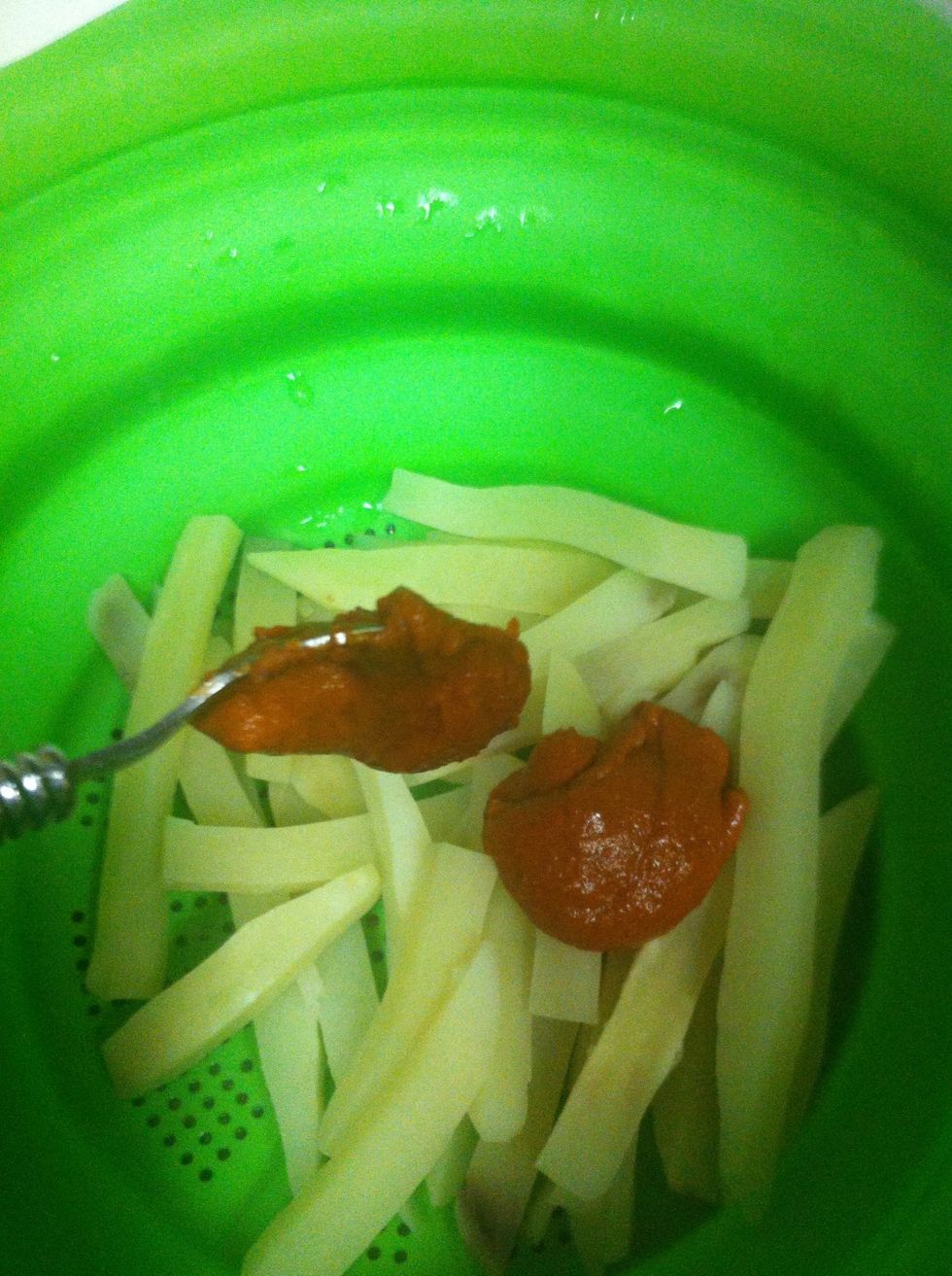 Once that timers up, add seasoning mixture to fries... You can use a new bowl if you'd like.