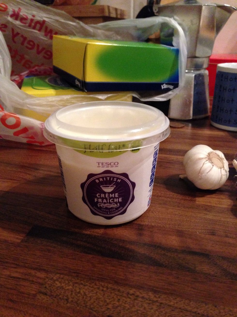 Once the alcohol has evaporated, add half a pot of creme fraiche