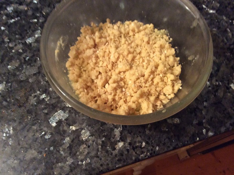 Once the apple has started to mush in the pot, take it off the heat and spoon into small oven dish. Sprinkle crumble mix over the top evenly and place in oven until slightly brown on top, check often.