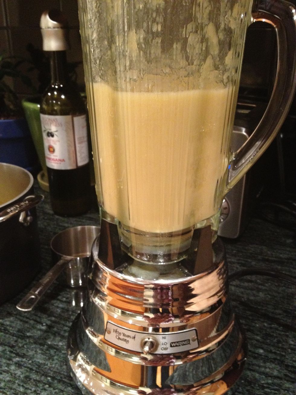 Once the artichokes are tender, remove from the heat and let cool for a couple minutes. Working in batches, add to a blender and process until smooth.