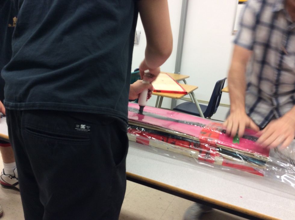 Once the bag has been sealed with the tar tape, you can then use the Super Pump and start releasing the air from the bag.