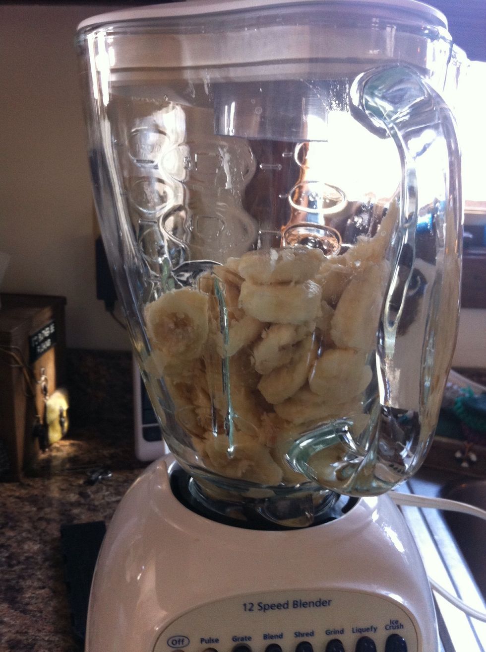 Once the bananas are frozen take them out of the freezer and put them in a blender.