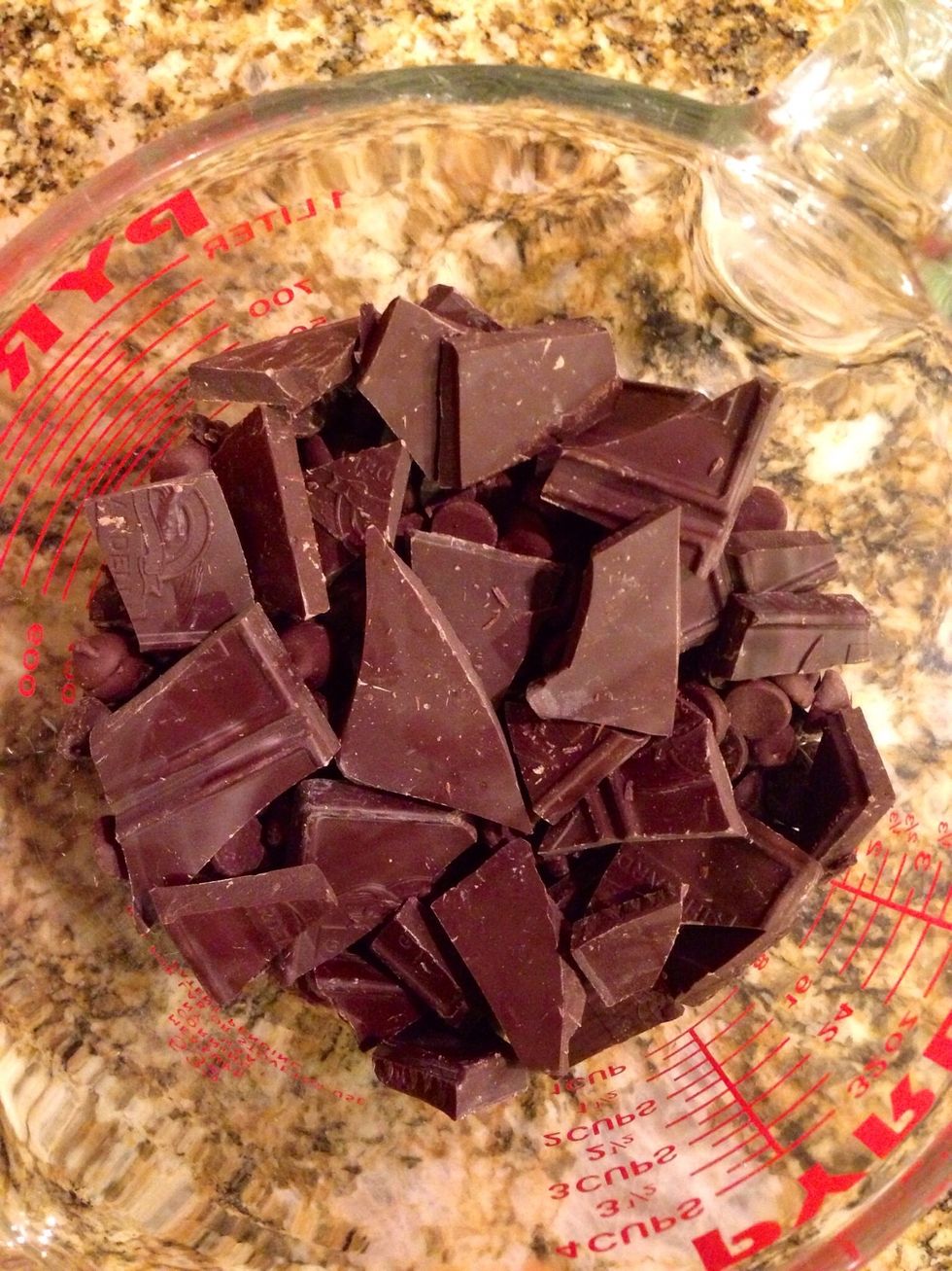 Once the bars are ready, grab your chocolate. Melt it in the microwave or by using a double boiler, it's your choice.