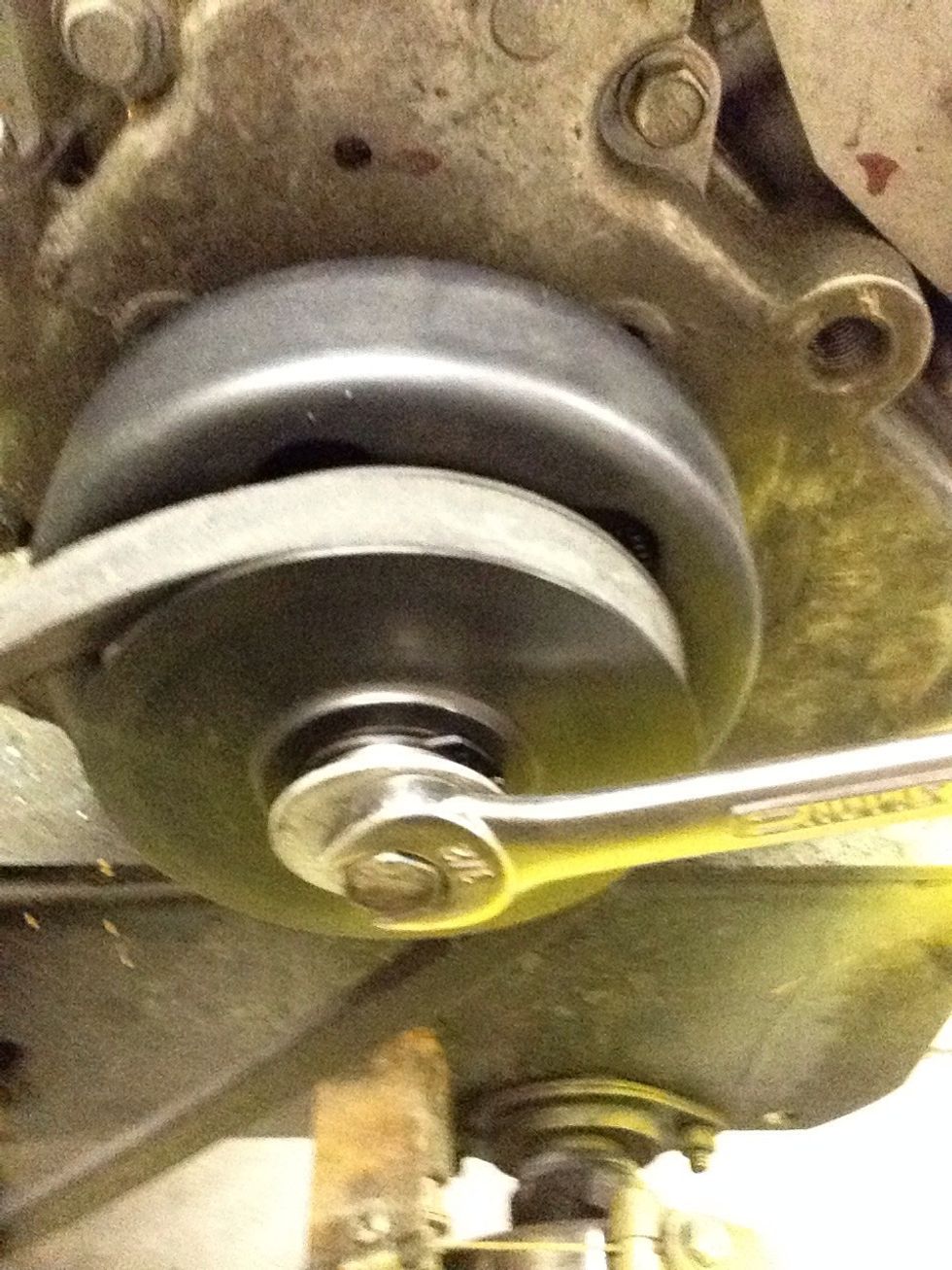 Once the belt is on you need to tighten the bolt on the end of the shaft.