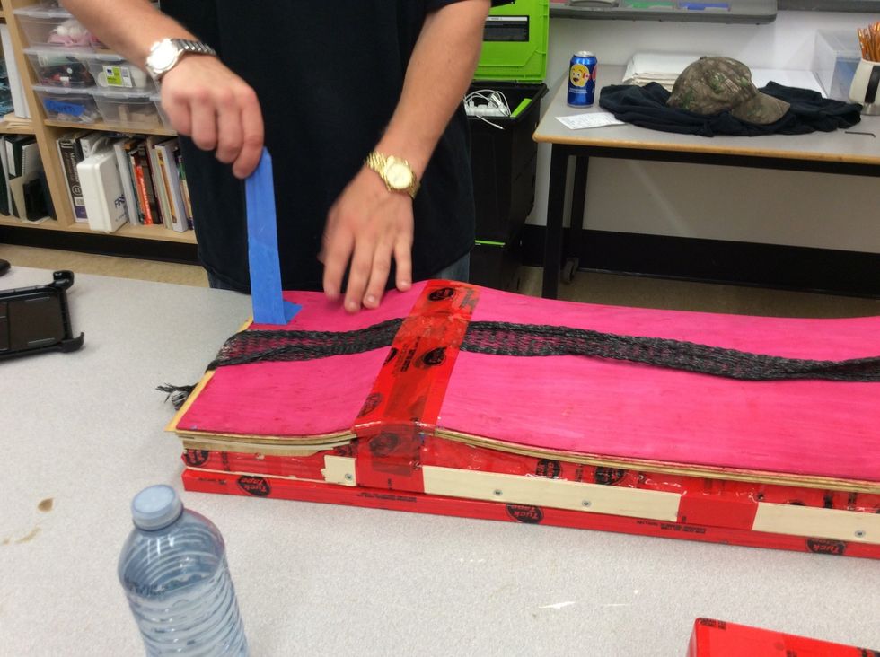 Once the board has been removed from the bag, you can then start peeling the tape and remove the breather net.