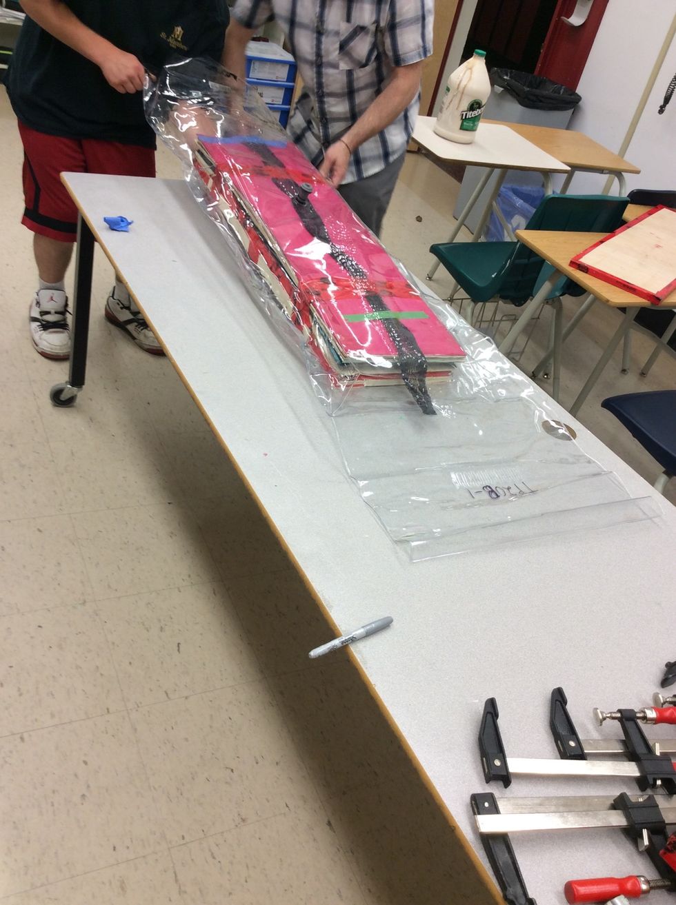 Once the board is inside the bag, you are now ready to seal the bag using tar tape.