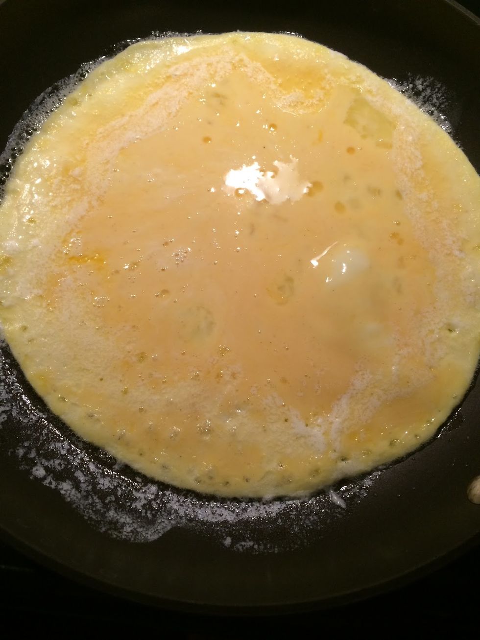 Once the bottom of the eggs is firm, stir the eggs with a spatula. Cook until it looks delicious!