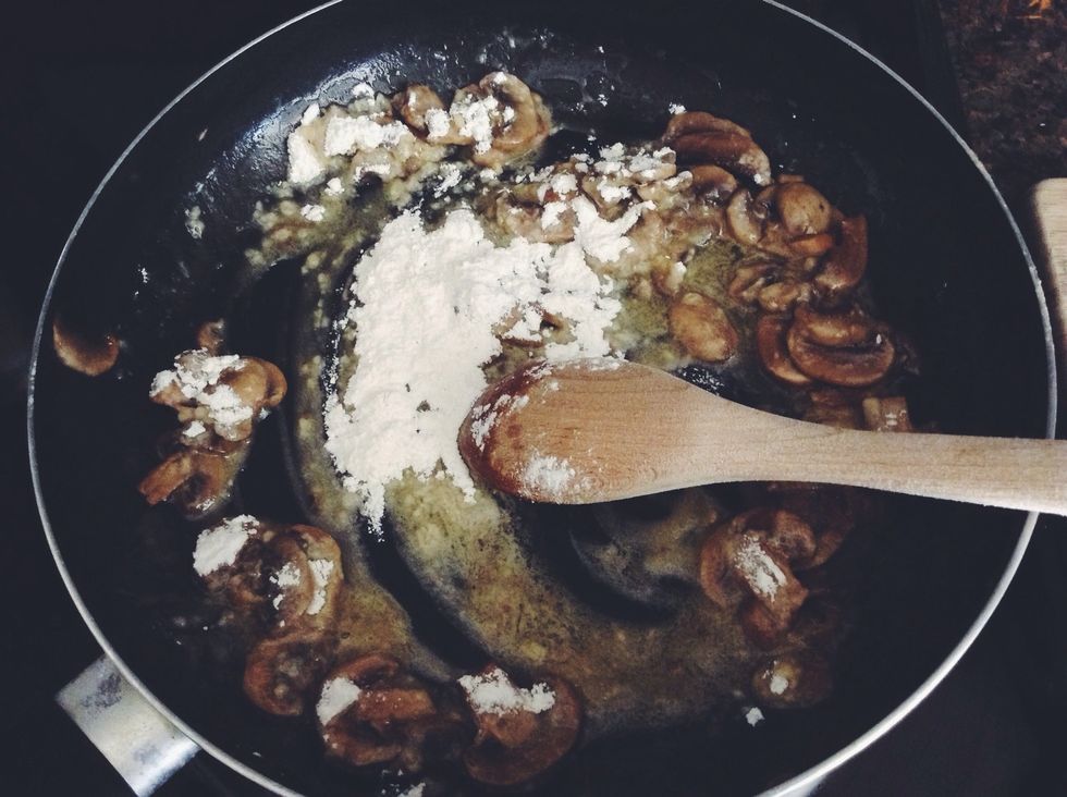 Once the butter has melted add 1/4 cup of flour. And stir till combined.