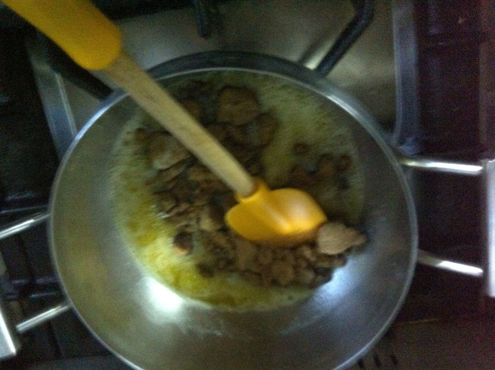 Once the butter melts, add 100 grams of dark brown sugar