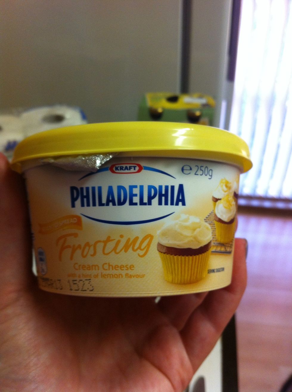 Once the cake is cool it can be iced... Normally I make my own cream cheese icing but I wanted to try the new pre-made stuff today