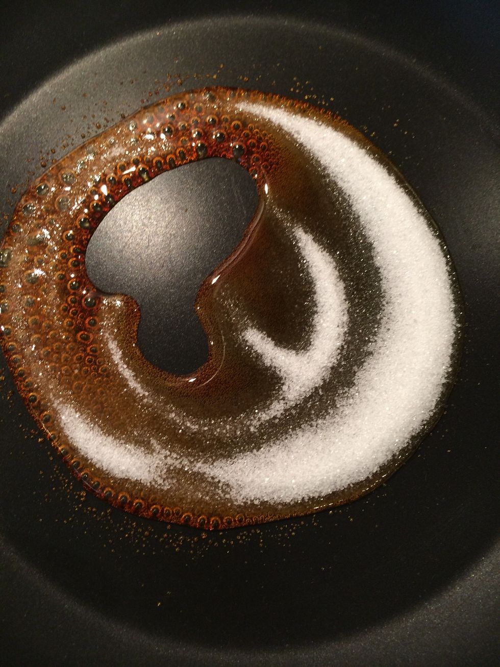 Once the caramel starts, add another 1/4 of the sugar