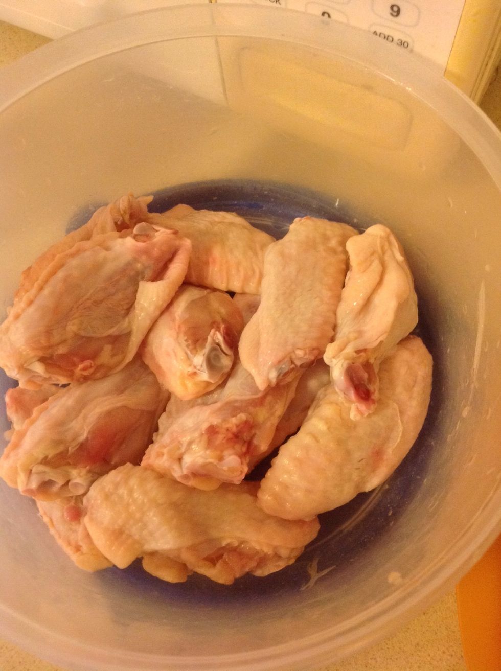 Once the chicken is cleaned with luke warm water, pluck any feathers that are visible to the eye. Drain all water out off the bowl