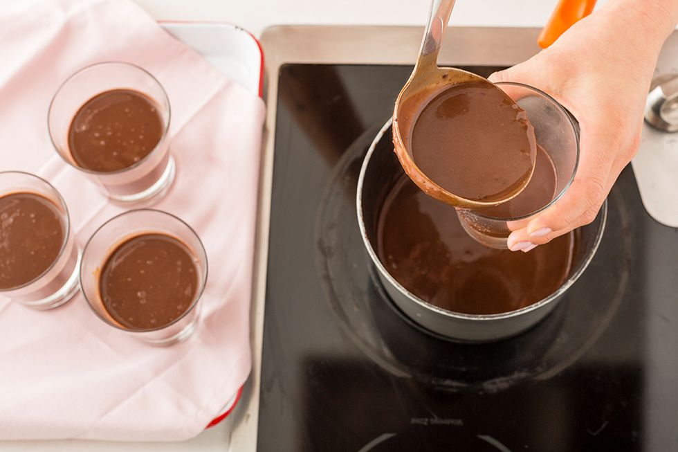 Once the chocolate is completely melted, pour the mixture into small glasses and refrigerate for two to three hours, or until firm.