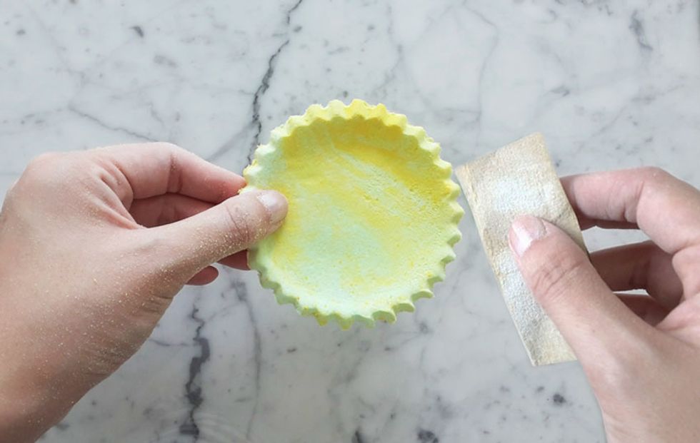 Once the clay is dried, run the sandpaper over to smooth down rough edges and to get rid of any small loose clay particles.