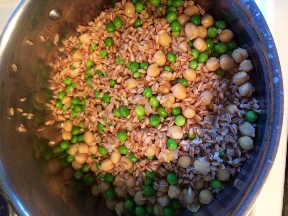 Once the contents of the pot are drained and rinsed, return them to the pot.