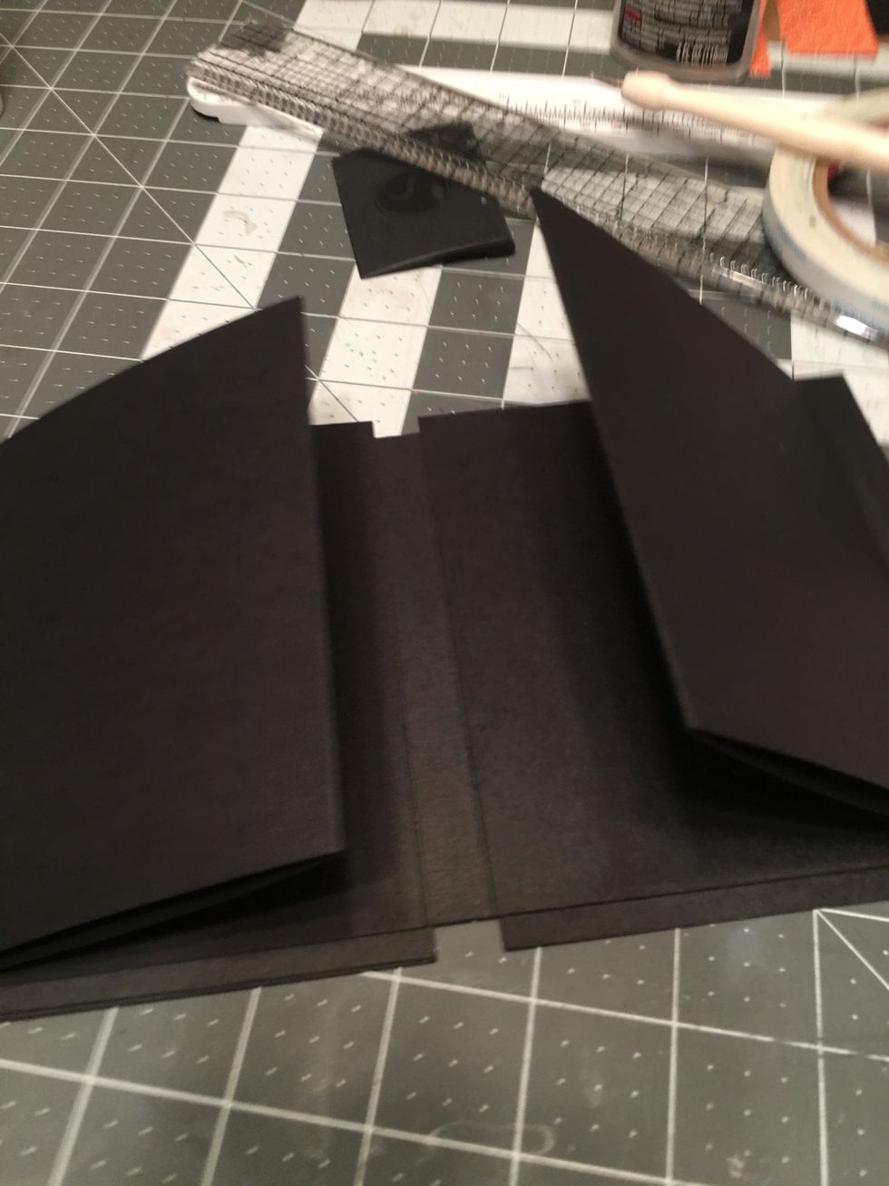 Once the covers are on, open up the album and check that the covers line up along the center fold lines as shown.