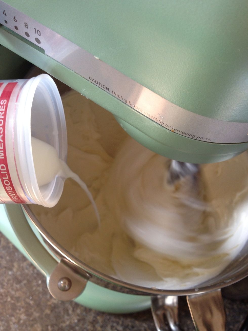 Once the crust is in the oven, turn speed to low and and in the milk. Scrape the sides once all added.