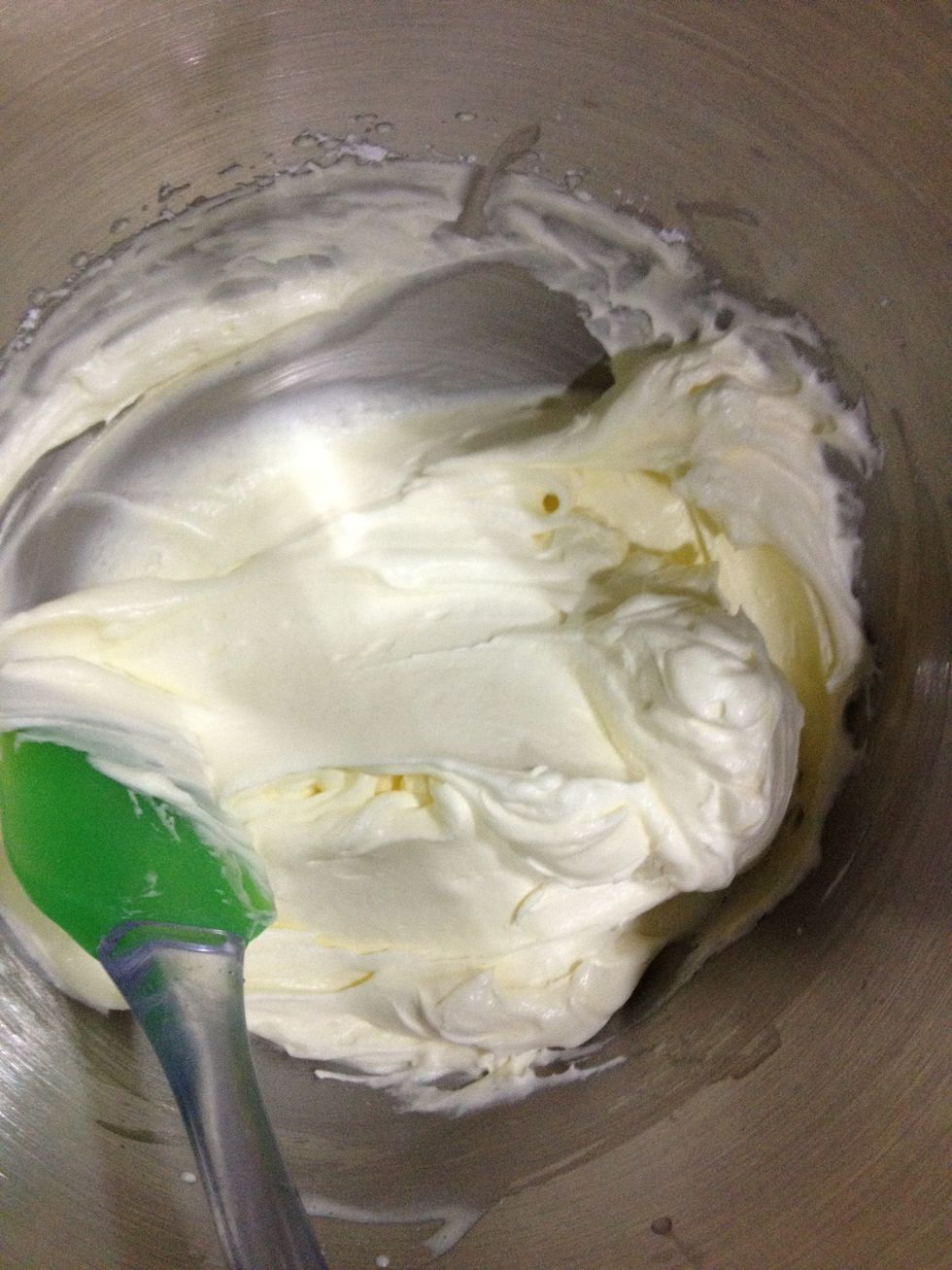 Once the cupcakes are done baking and completely cooled off, make this frosting. Simply whip up the heavy cream adding one tbsp of powdered sugar at a time until stiff peaks are formed.