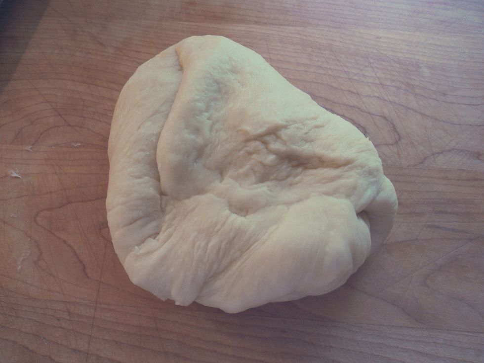 Once the dough has risen, knead the dough again to remove any gas from the inside.