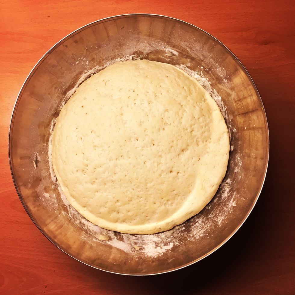 Once the dough has risen split in four pieces