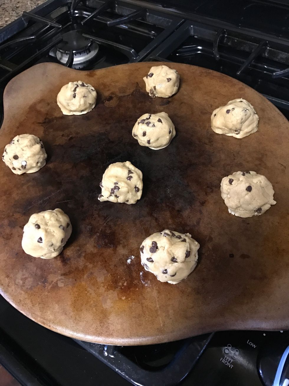 Once the dough is made, use a spoon to scoop small balls of dough onto the cookie sheet and place them in the oven for 10-12 minutes