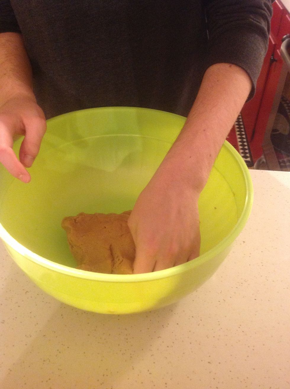 Once the dough is mixed well, with your hands, smooth dough into a ball.