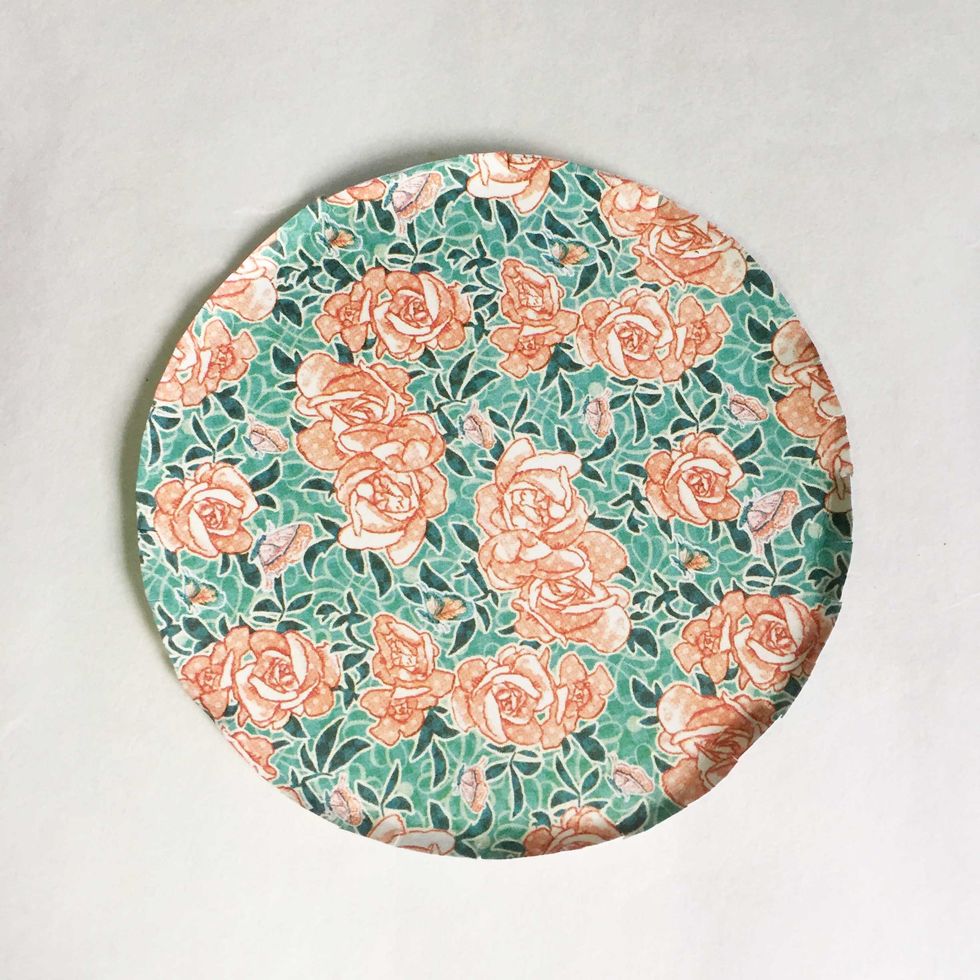 Once the edges are curved up, it look like a plate. This is to ensure easy placement of the bottom base into the roll.