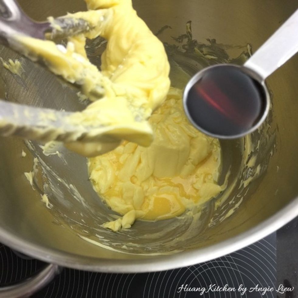 Once the egg has been combined and we have a smooth batter, add in vanilla extract. Continue to beat until well blended.