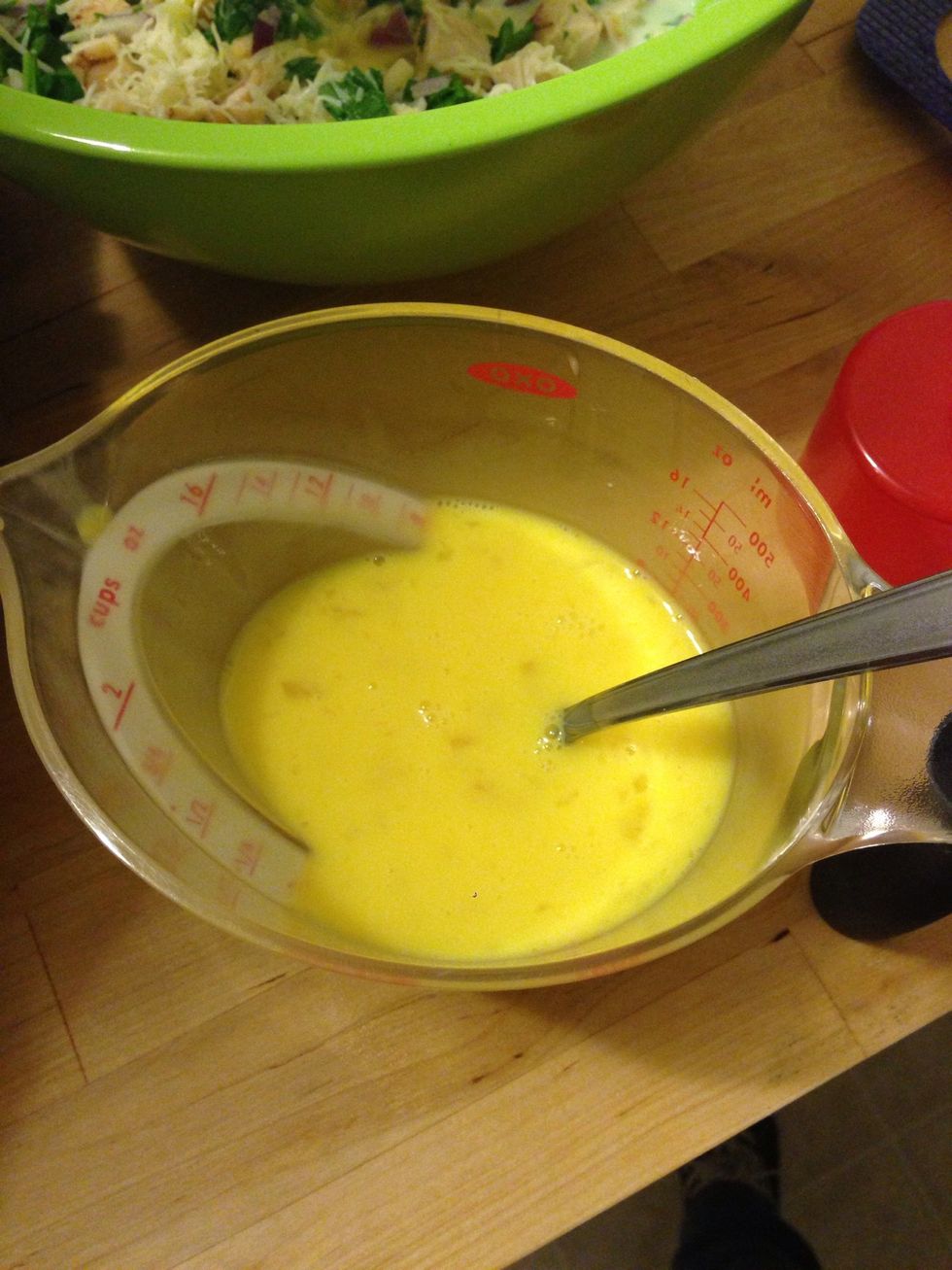 Once the eggs are good and whisked, add them to the mixture. It's easy to do with a fork.