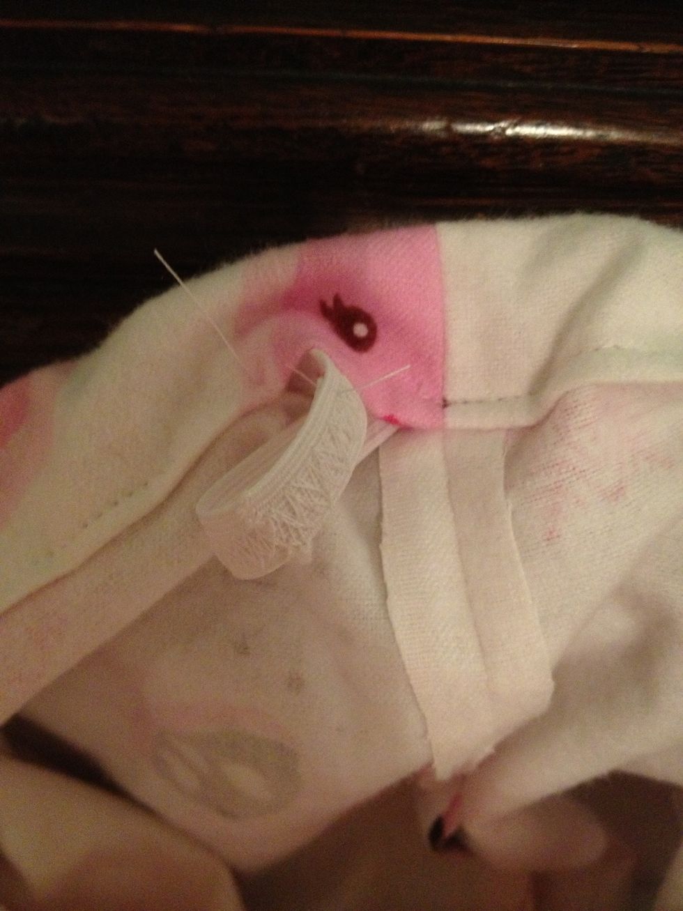 Once the elastic is sewn together, you can tuck it into the waistband, and stitch up the rest of the seam.