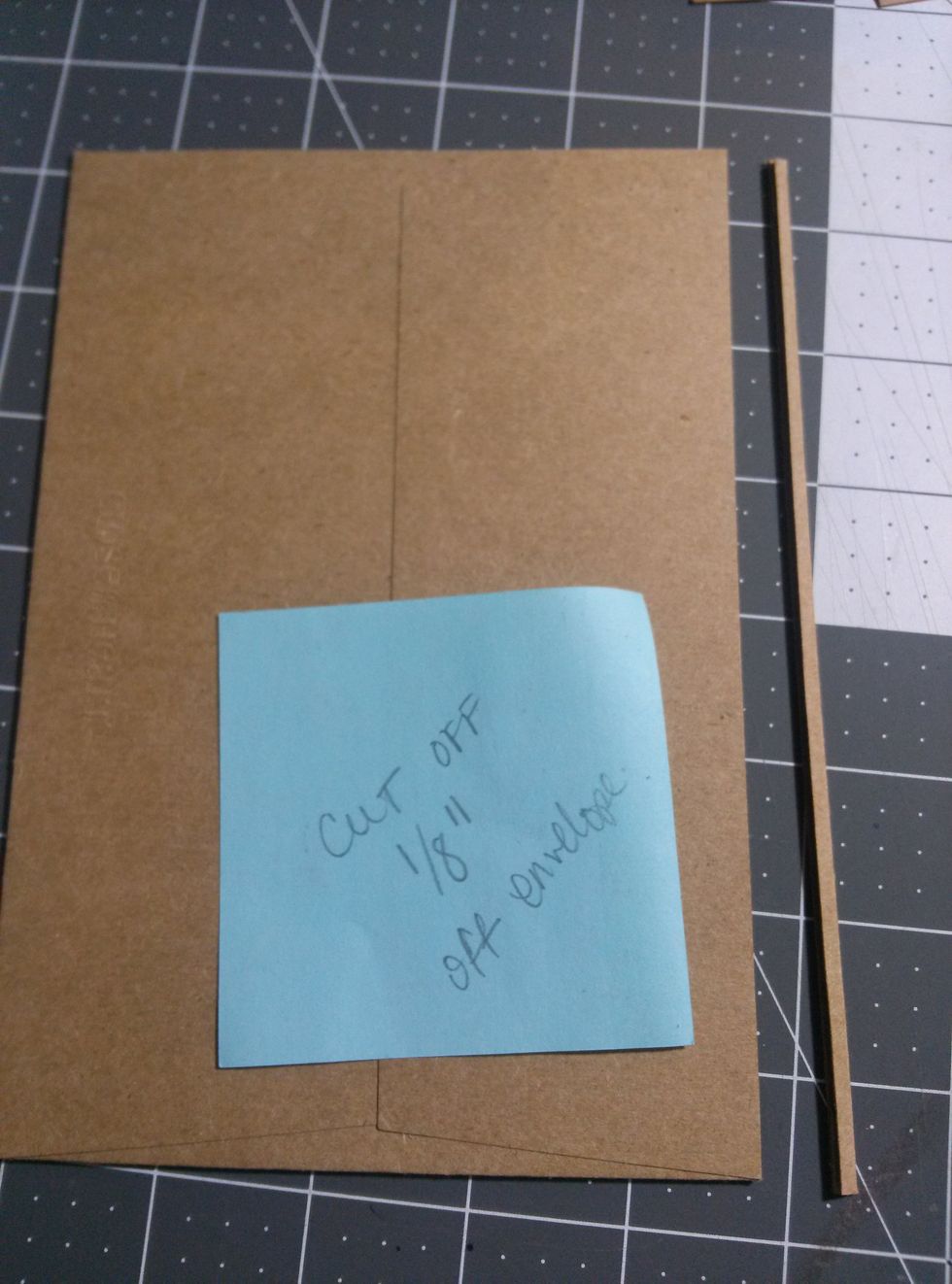 once the envelope is sealed cut off 1/8" from the top of the envelope to create an opening