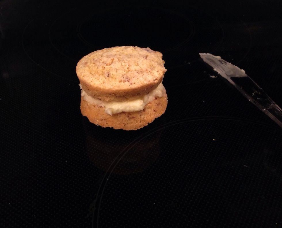 Once the filling is on one bun add the other bun on