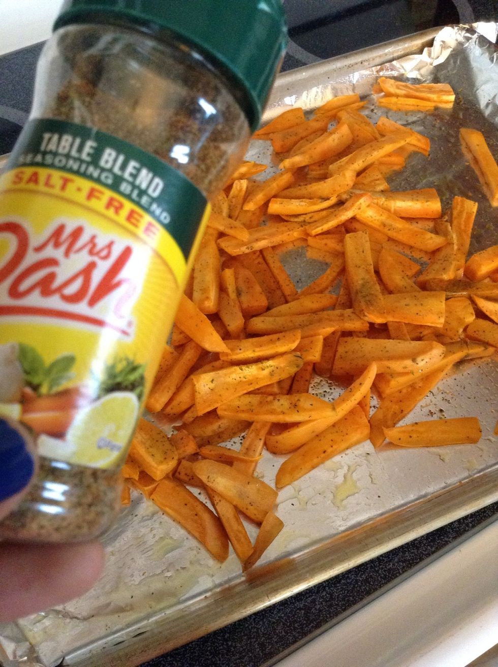 Once the fries are soft, add another coat of seasoning
