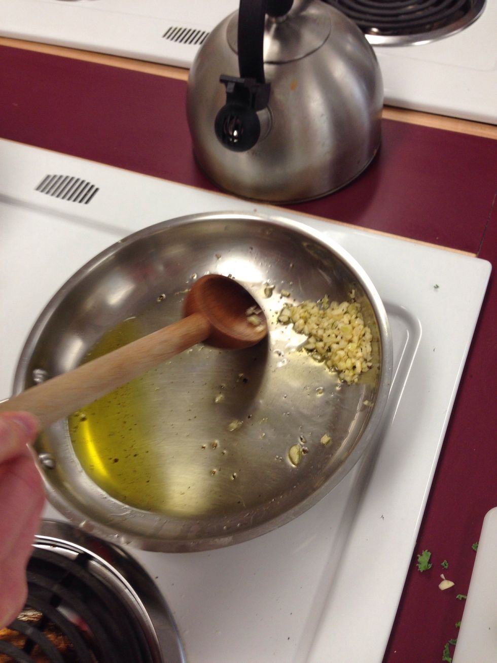Once the garlic is cooked separate it and throw it away. Keep the olive oil