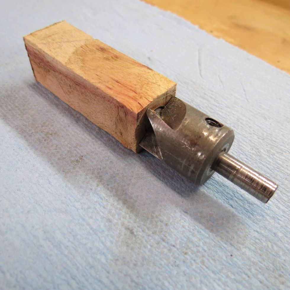 Once the glue has dried, use a barrel trimmer to square up each end. The barrel trimmer attaches to your hand drill (not shown). Go slow and don't crack the wood.