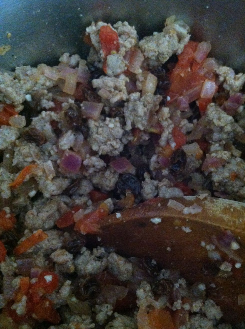 Once the ground turkey is done, incorporate that into the other pan as shown.