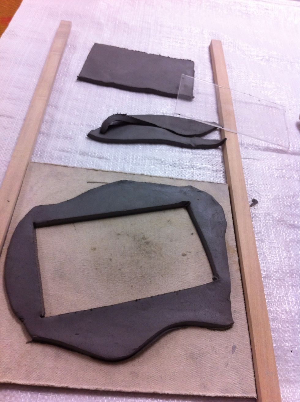 Once the inside piece is cut, I go back and cut the edges to have an organic free from feel.