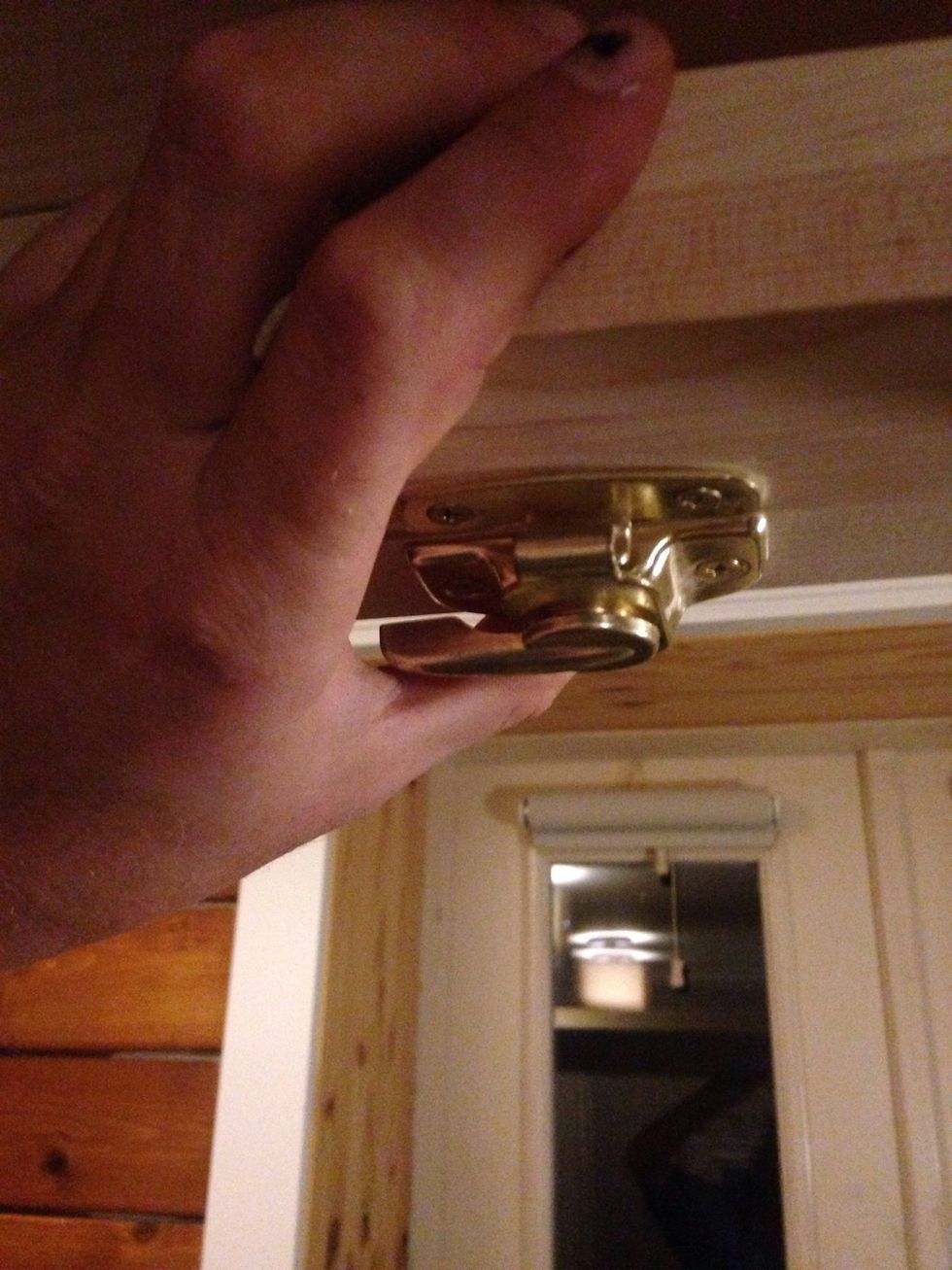 Once the legs have collapsed, lock them in place