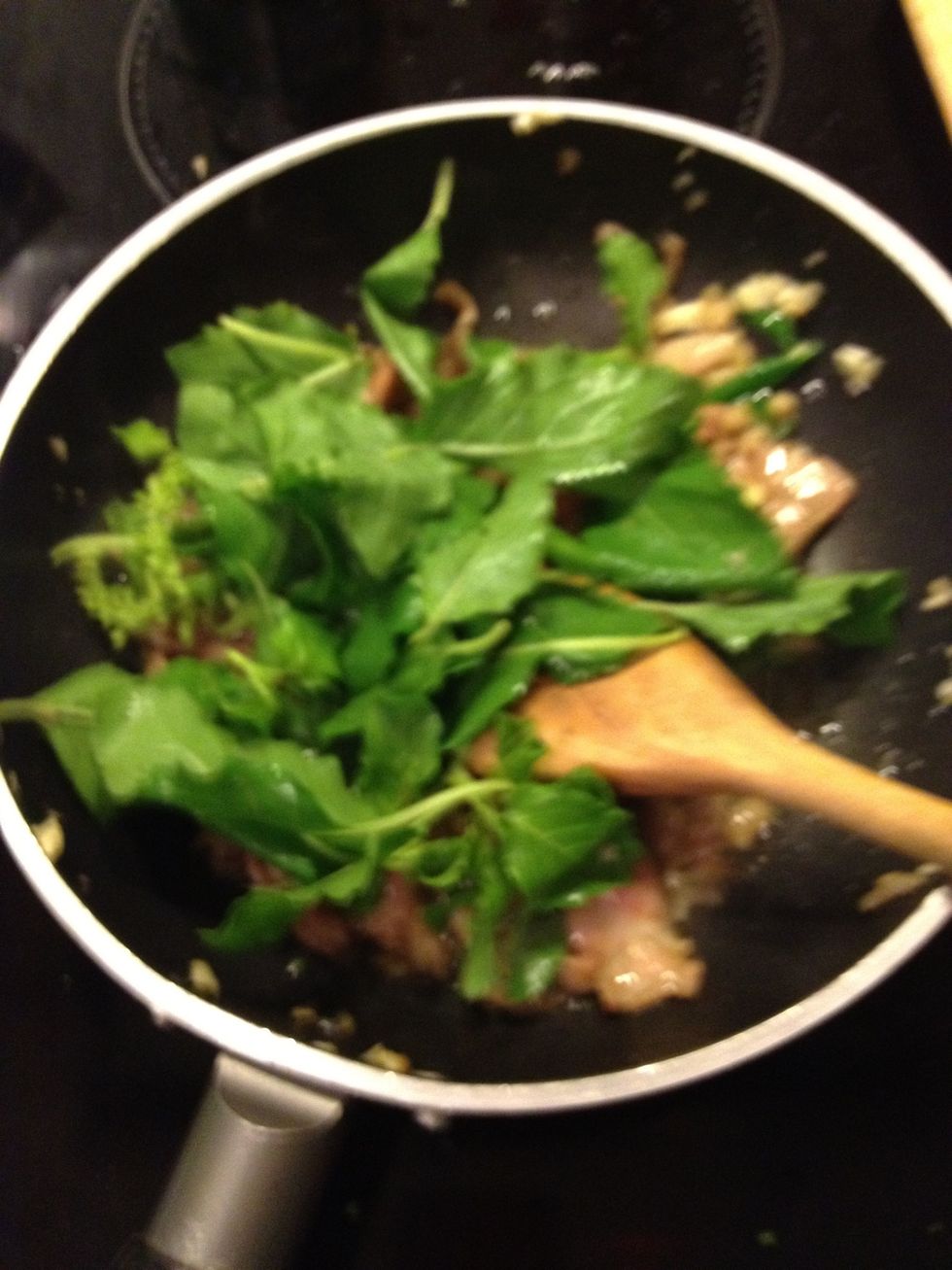 Once the meat is cooked add the basil and take off the heat. Season with fish sauce.